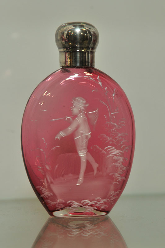 Appraisal: RUBY GLASS PERFUME BOTTLE Having white enameled figural decoration depicting