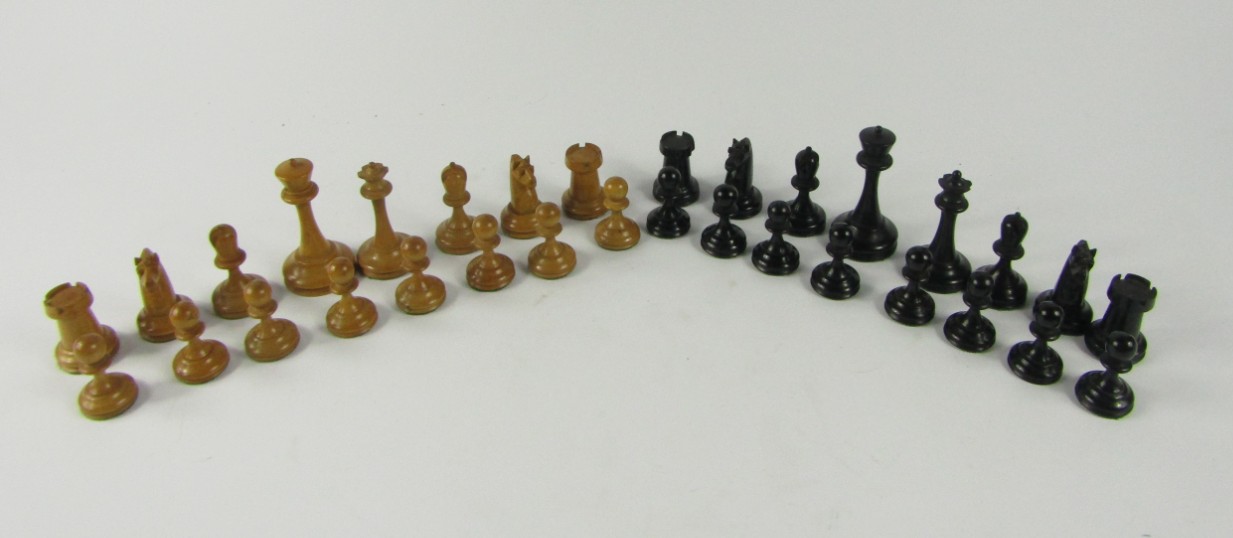 Appraisal: A Staunton type carved boxwood and ebony chess set King