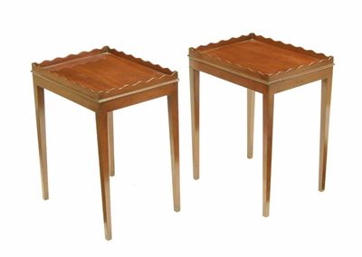 Appraisal: A pair of mahogany occasional tables each with a wavy