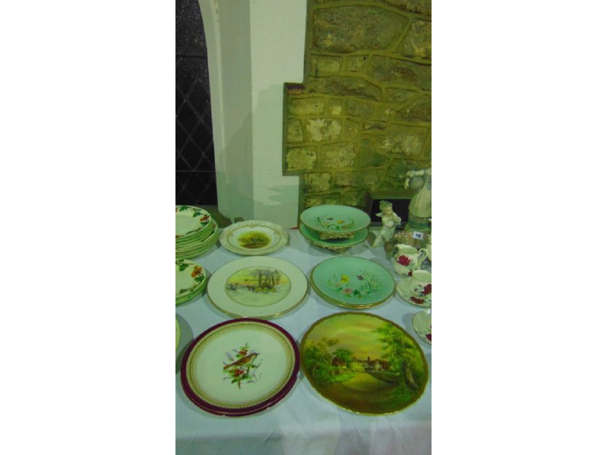 Appraisal: A collection of th century pale green ground dessert wares