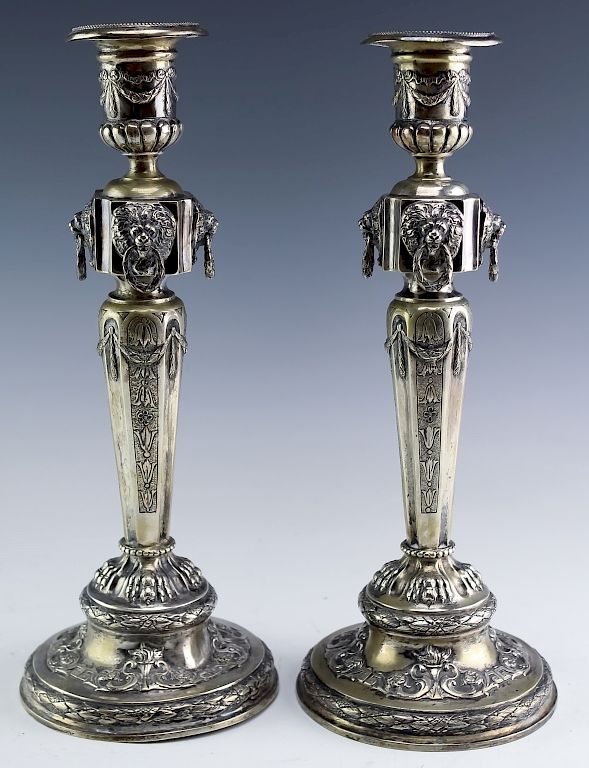 Appraisal: Pr European Silver Repousse Candlesticks g Features lion face with