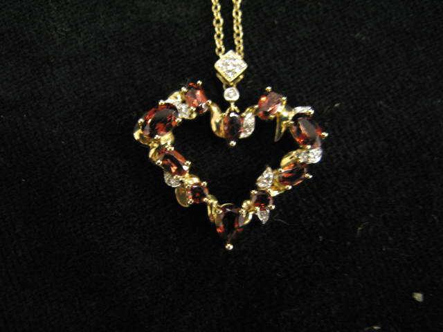 Appraisal: Garnet Diamond Heart Pendant rich garnets carats highlighted by diamonds