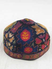 Appraisal: An antique skullcap probably Turkish Islamic finely embroidered overall in