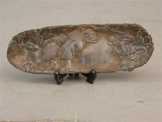 Appraisal: th century Chinese bronze oval dish embossed with a figure