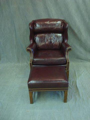 Appraisal: Leather Arm Chair with Ottoman From a Southampton area home