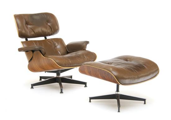 Appraisal: n Eames Chair and Ottoman by Herman Miller model numbers