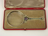 Appraisal: MAGNIFYING GLASS - Hand held gilded silver with a green