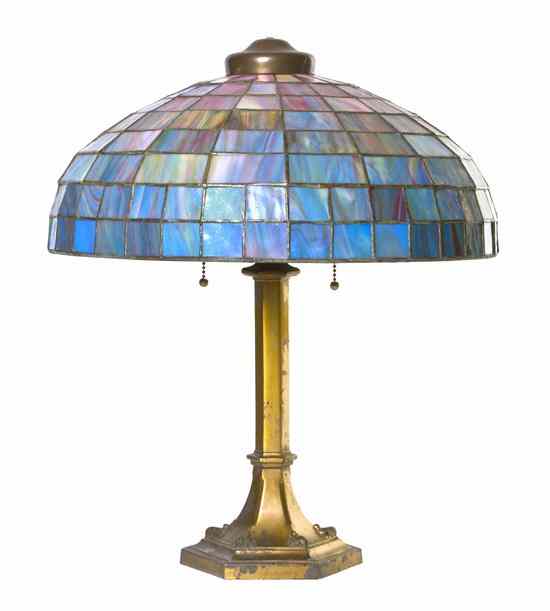 Appraisal: An American Leaded Glass Lamp the domed shade having geometric