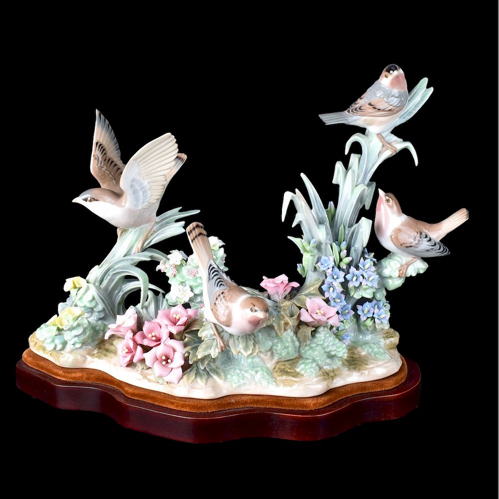 Appraisal: Lladro Bird Group Lladro Birds and Flowers porcelain group on