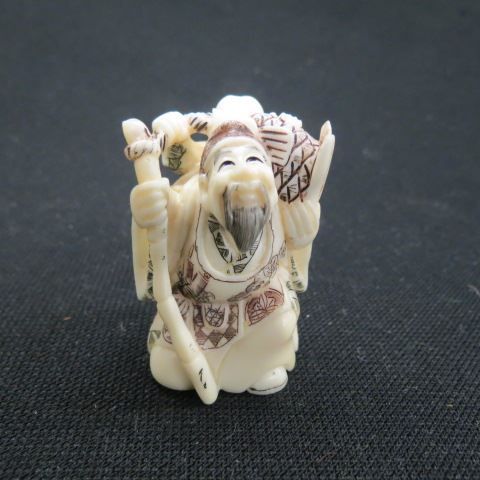 Appraisal: Chinese Carved Ivory Netsukeof Father Son polychromed signed excellent