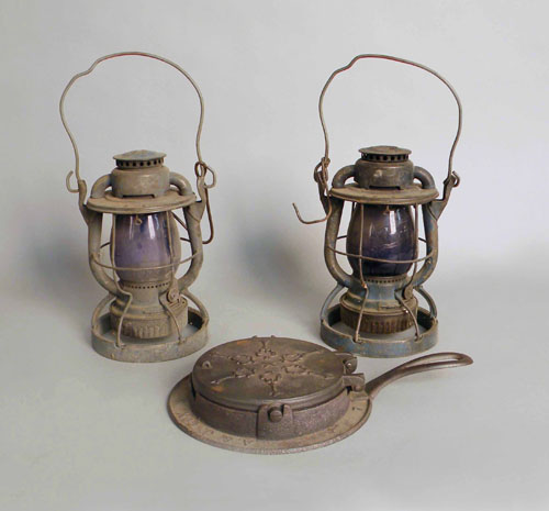 Appraisal: Two Dietz lanterns h together with an A J Cox