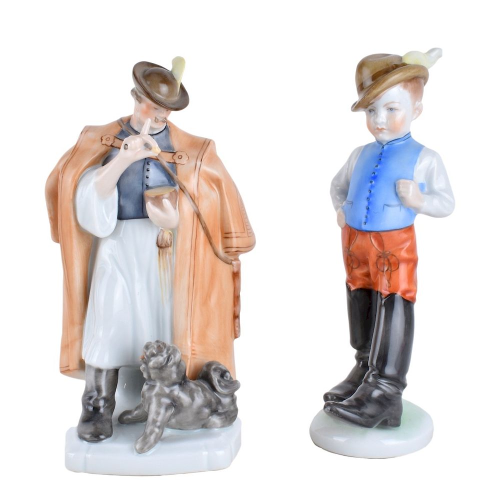 Appraisal: Two Herend Figurines Boy with Boots Man with Dog Two