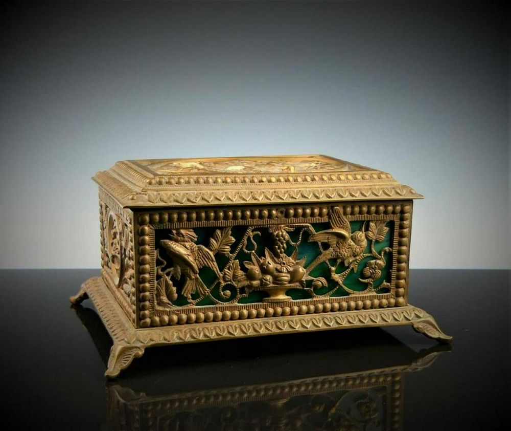 Appraisal: ANTIQUE LARGE BRONZE DRESSER BOX WITH SLAG GLASS Box is