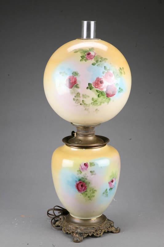 Appraisal: GONE-WITH-THE-WIND LAMP Yellow with handpainted floral decoration sitting on a