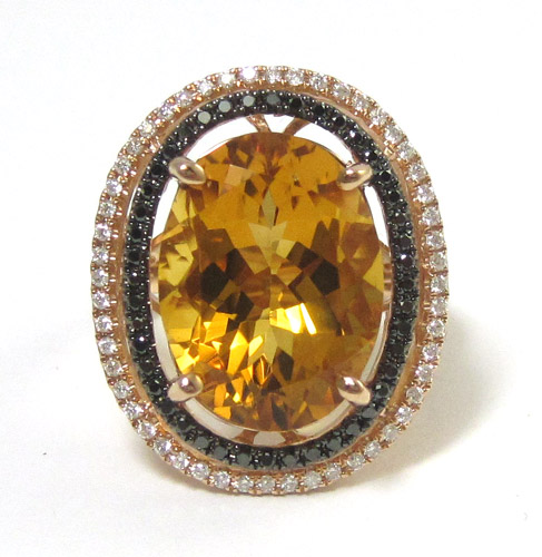 Appraisal: SPESSARTITE GARNET AND DIAMOND RING k white and yellow gold