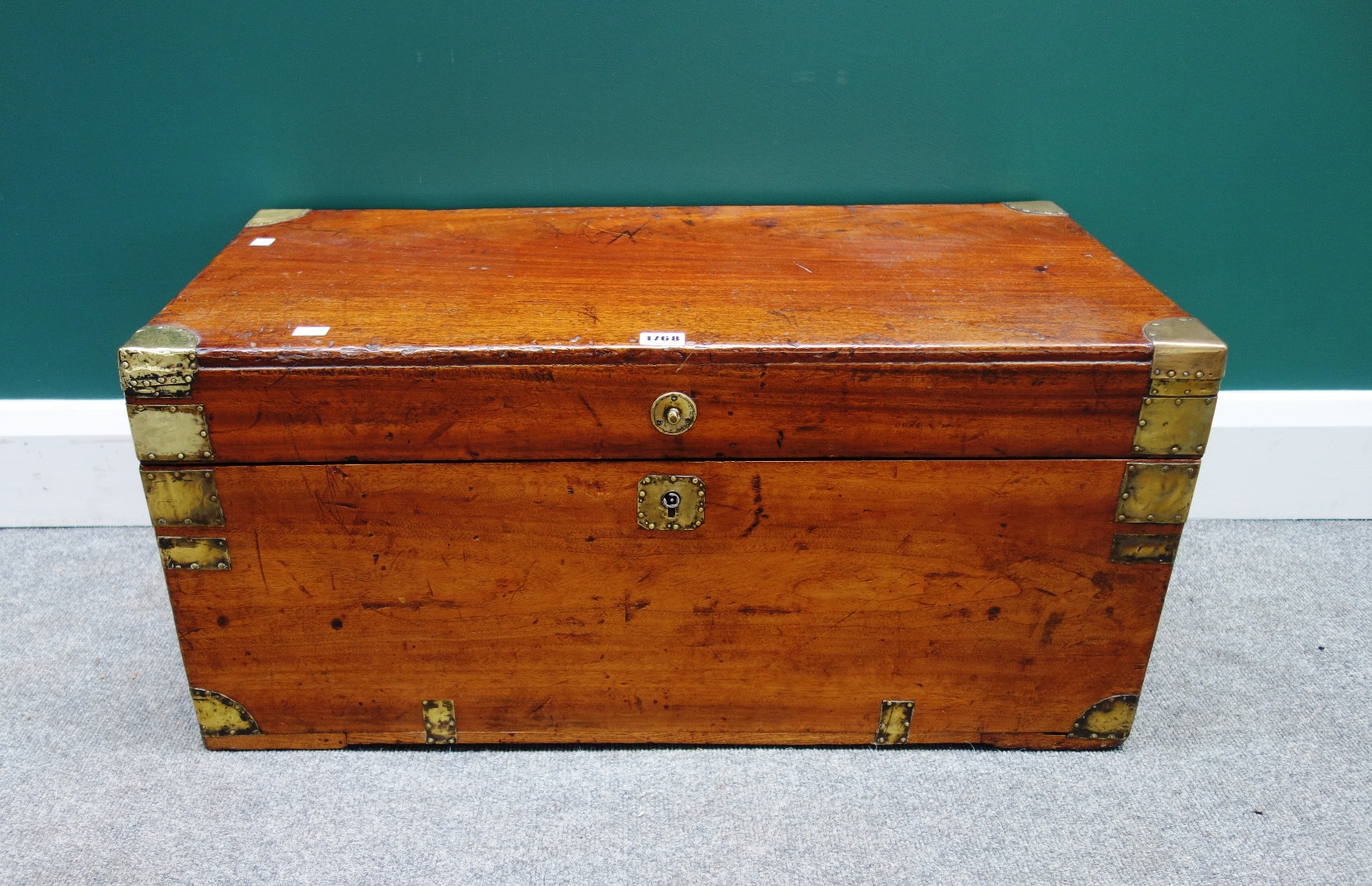 Appraisal: A th century brass bound camphor wood trunk with side