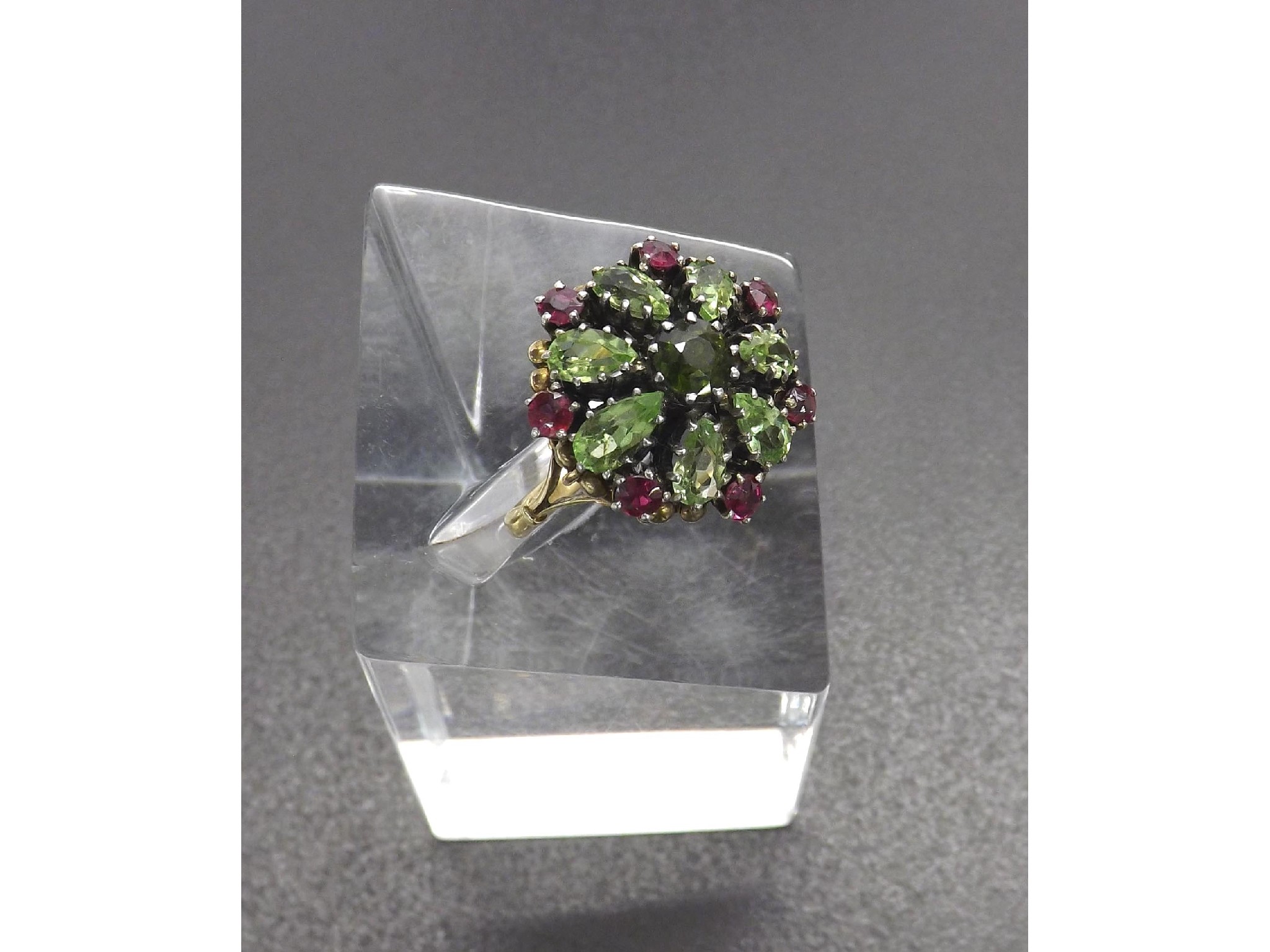 Appraisal: ct garnet and peridot dome cluster ring with a yellow