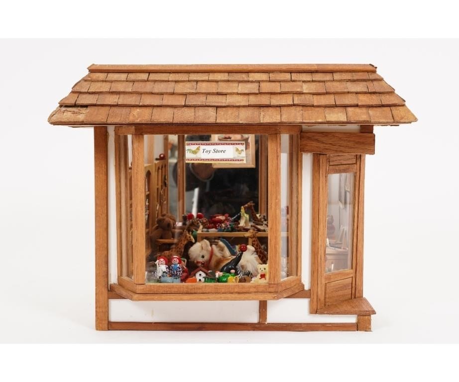 Appraisal: Toy store room box has a large bay window and