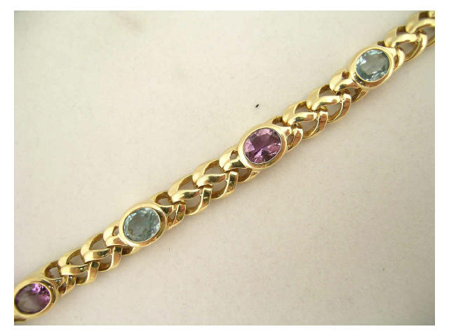 Appraisal: K yellow gold bracelet set with amethyst and aquamarine semi-precious