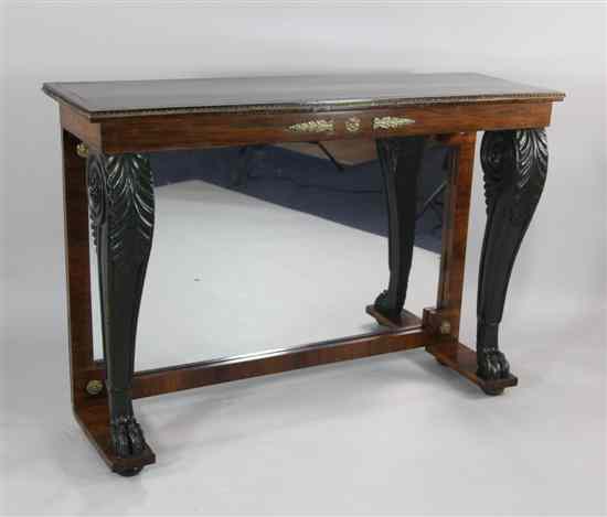 Appraisal: A Regency brass inlaid rosewood console table with mirrored back