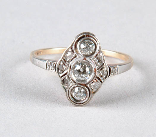 Appraisal: DIAMOND AND GOLD LADIES RING Antique mount having three lateral