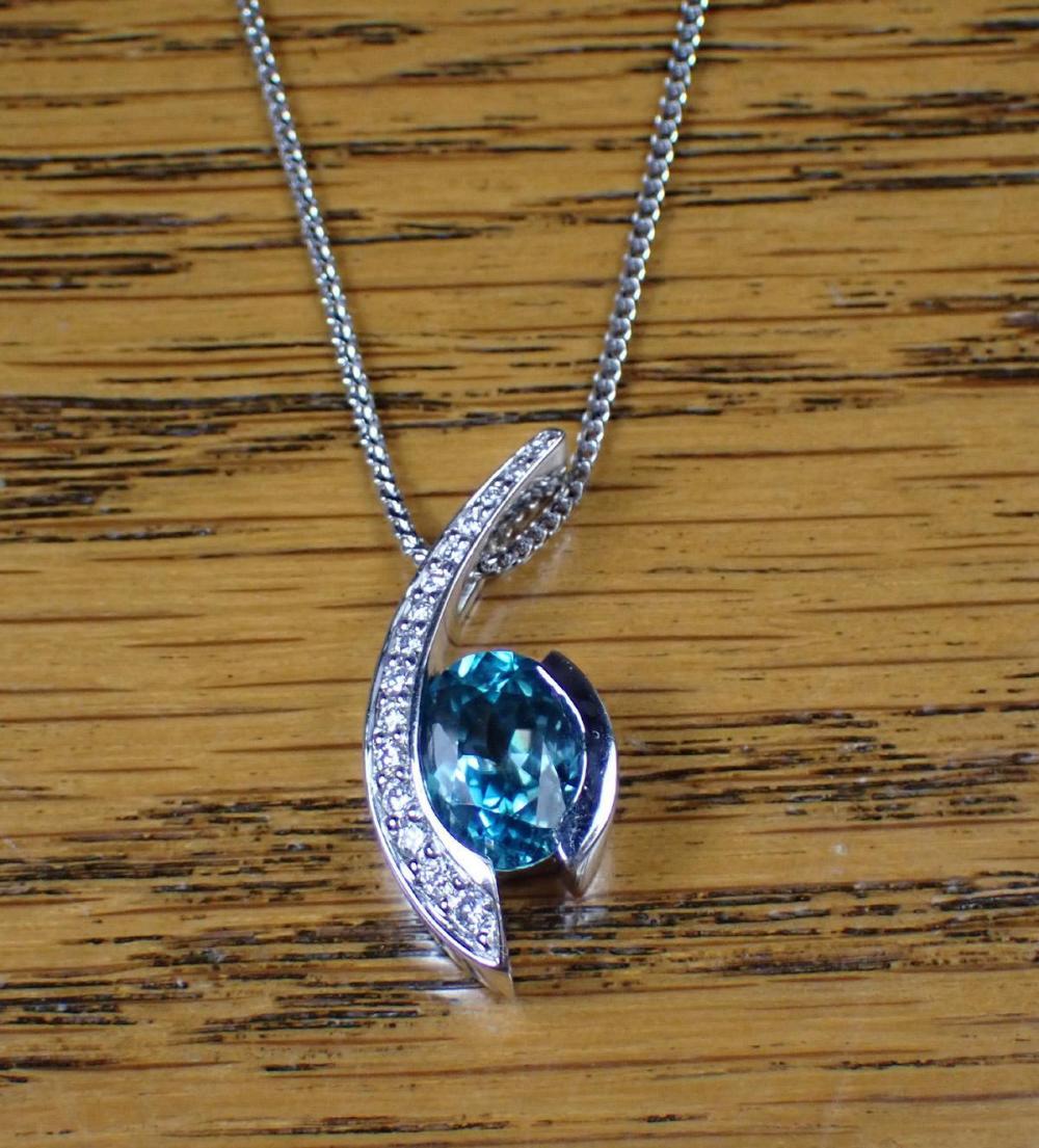 Appraisal: ZIRCON DIAMOND AND WHITE GOLD PENDANT NECKLACE with a k