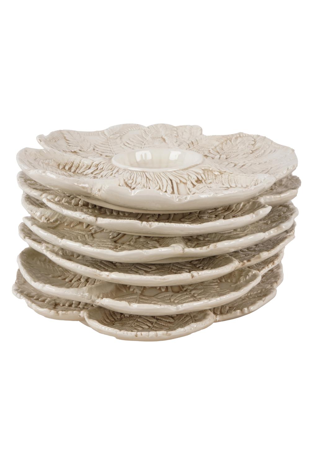 Appraisal: TWELVE ITALIAN WHITE-GLAZED CERAMIC ARTICHOKE PLATESunmarked Condition some with chips