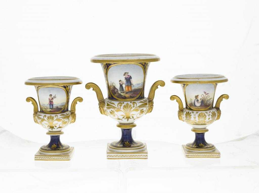 Appraisal: A DERBY GARNITURE OF THREE VASES of campana shape with