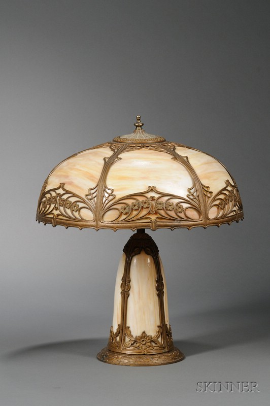 Appraisal: Painted Metal Overlaid Caramel Bent Slag Glass Panel Table Lamp