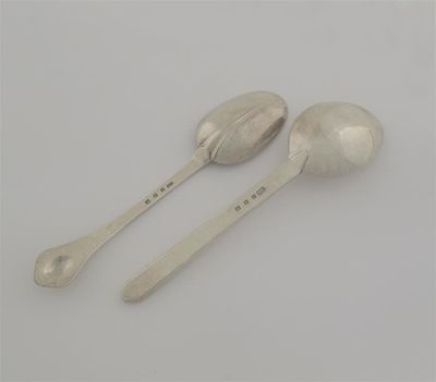 Appraisal: By the Guild of Handicrafts two handmade spoons London the