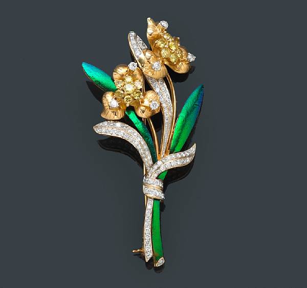 Appraisal: A diamond colored diamond and beetle wing brooch estimated total