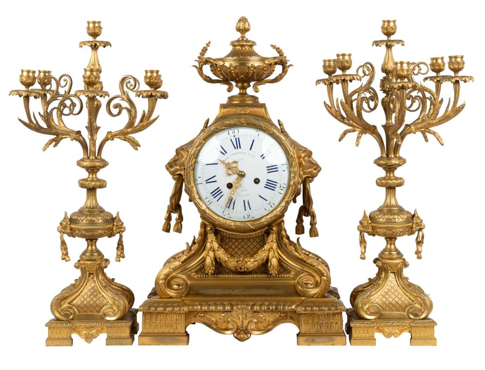 Appraisal: FRENCH GILT BRONZE CLOCK GARNITUREthe clock signed to dial Lemerle-Charpentier