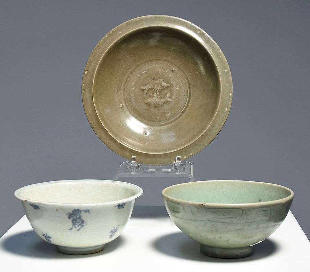 Appraisal: Three celadon bowls Three celadon bowls - x low relief