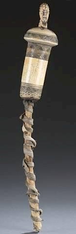 Appraisal: African carved ivory scepter with elephant hide An African carved