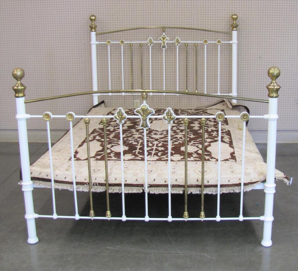 Appraisal: Antique cast iron painted white bed frame with brass accents