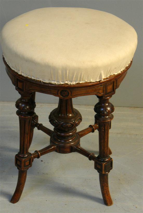 Appraisal: th century walnut adjustable round piano stool with carved reeded