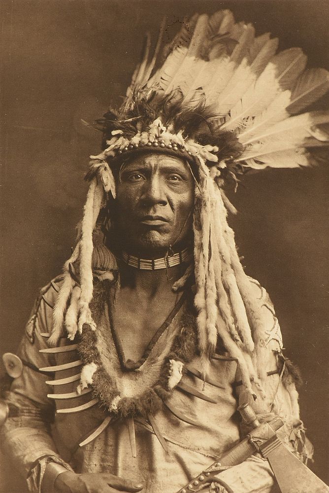 Appraisal: after EDWARD SHERIFF CURTIS American - A PHOTOGRAPH Weasel Tail-Piegan