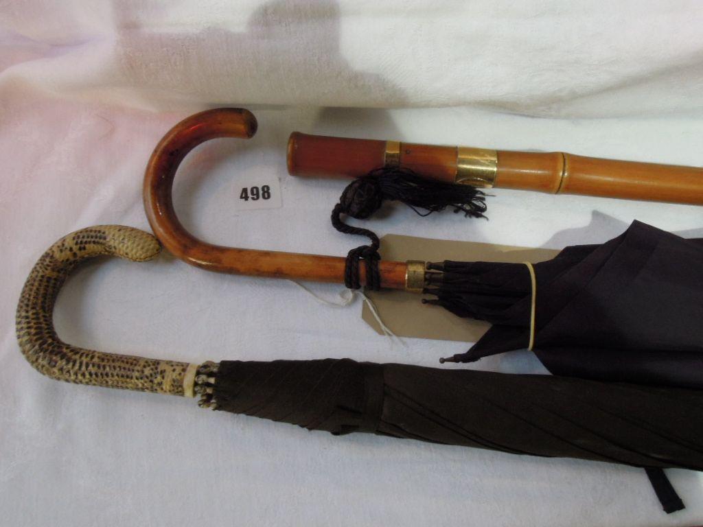 Appraisal: A gentleman's black silk umbrella with ct gold plate band