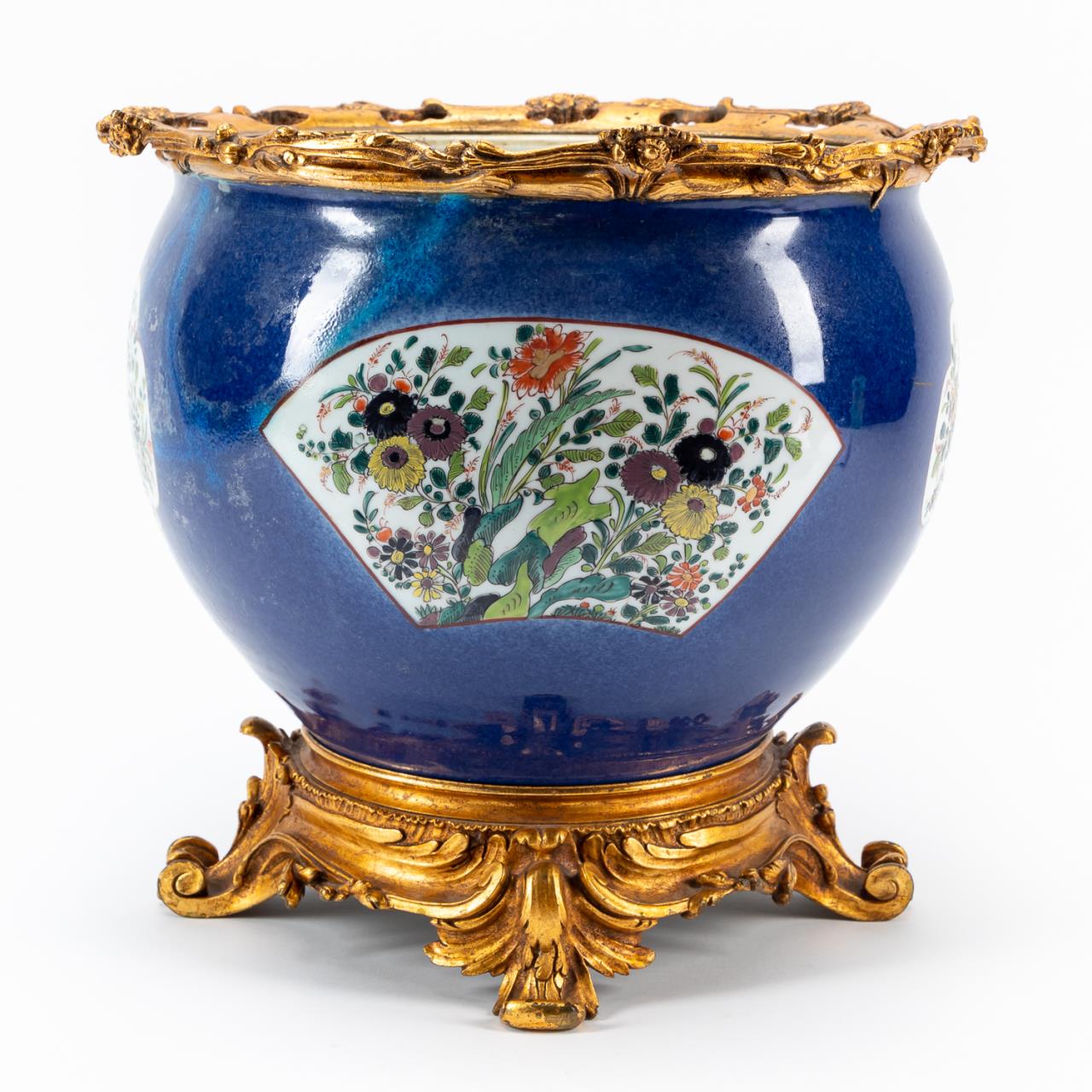 Appraisal: CONTINENTAL BRONZE MOUNTED PORCELAIN JARDINIERE Continental gilt bronze mounted porcelain