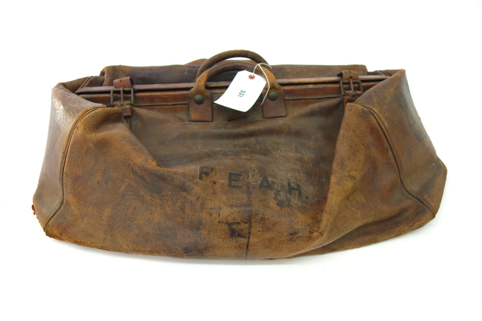 Appraisal: A large vintage brown leather Gladstone bag approximately cm across