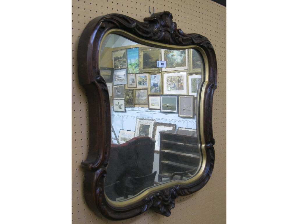 Appraisal: Mahogany and parcel gilt wall mirror