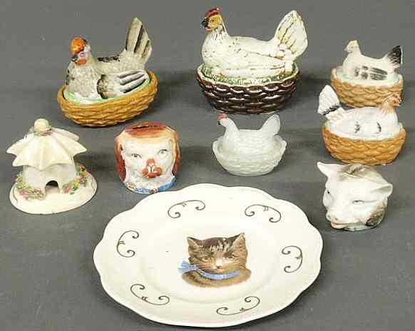 Appraisal: Four small th c Staffordshire hens-on-nests largest x a milk