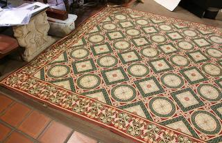 Appraisal: Chinese Aubusson style needlepoint carpet having geometric designs in green