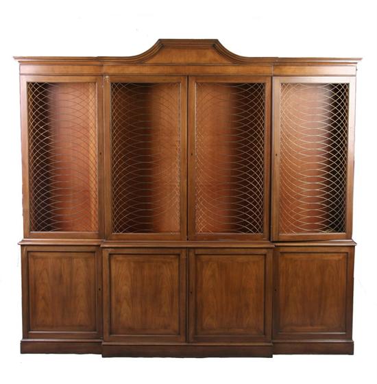 Appraisal: BAKER WALNUT BREAKFRONT BOOKCASE late th century Baker Furniture Projecting