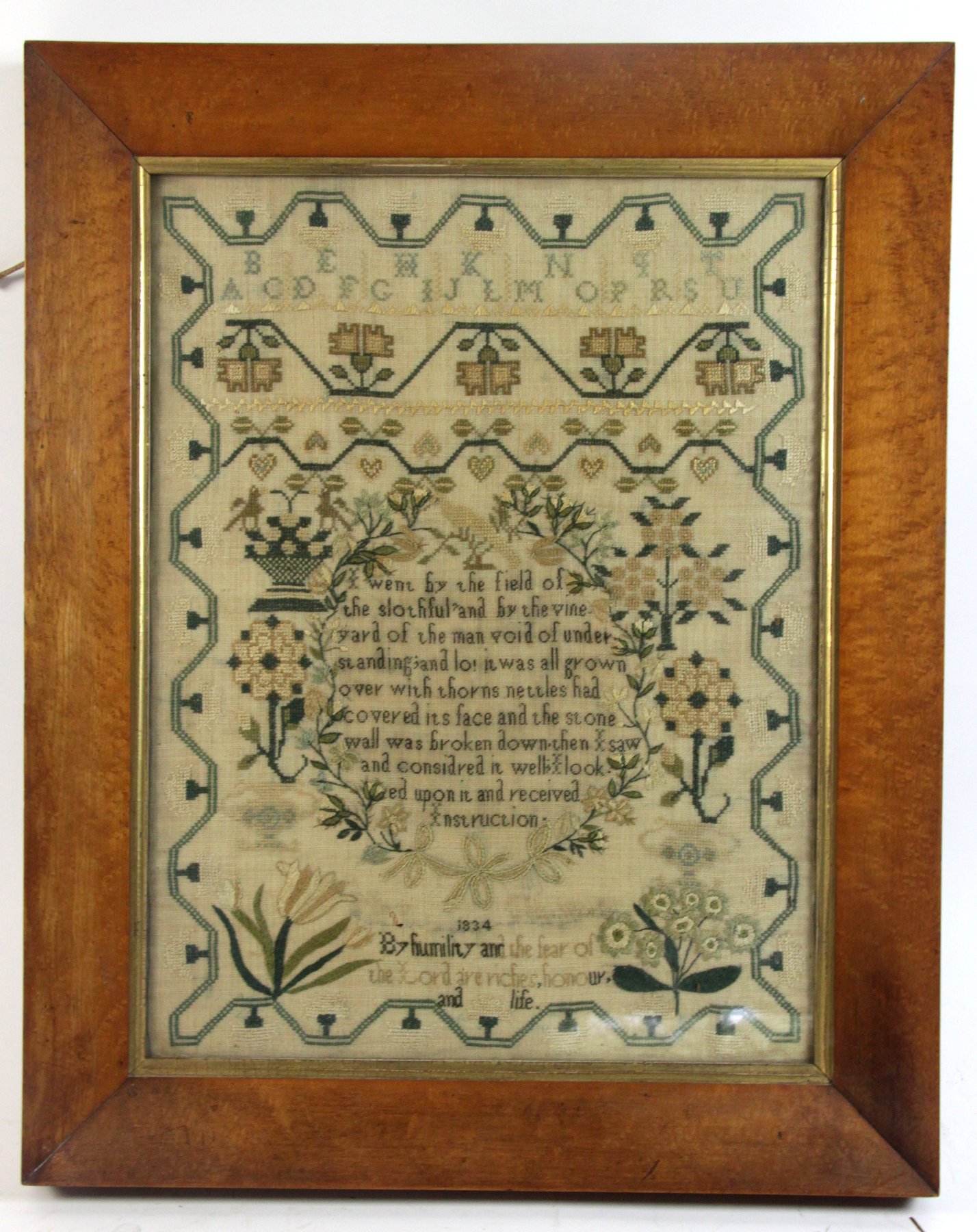 Appraisal: A needlework sampler dated framed cm x cm x