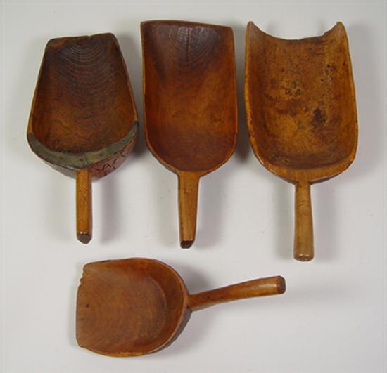 Appraisal: Four Large Wooden Scoops Circa Various hardwoods Chips cracks and