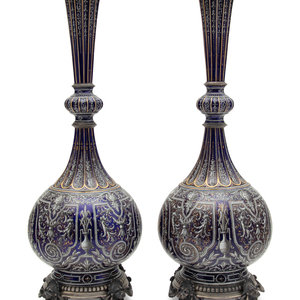 Appraisal: A Pair of Continental Gilt and Enameled Cobalt Glazed Porcelain