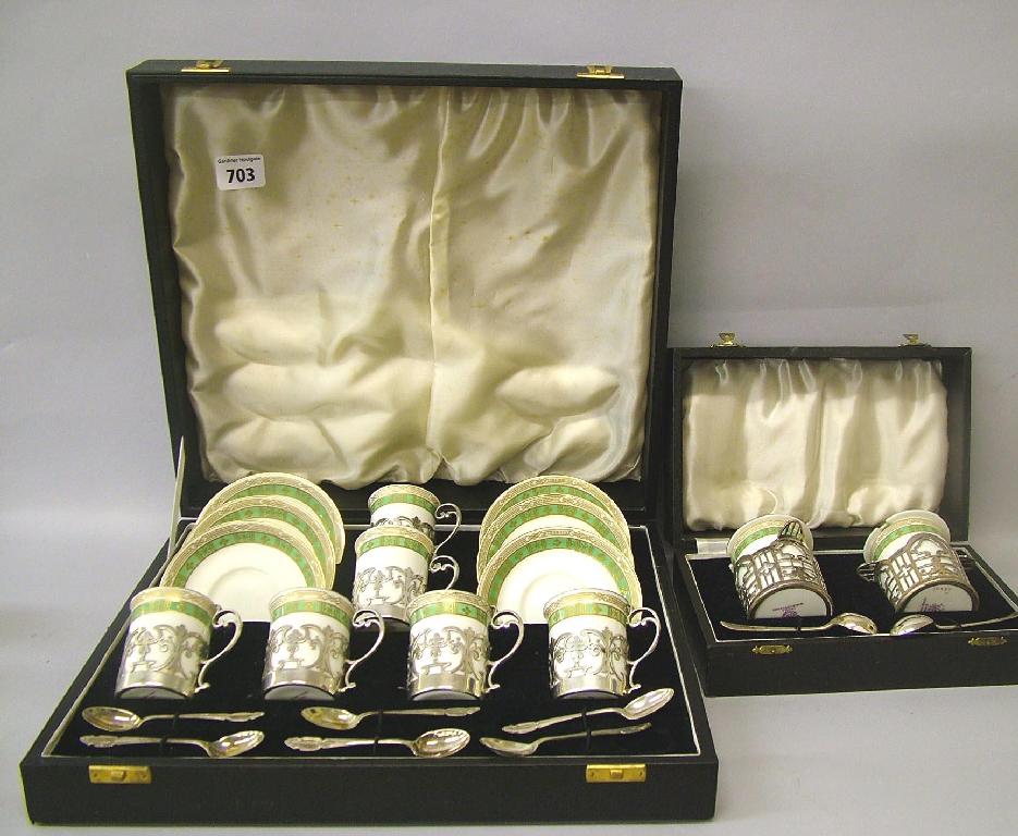 Appraisal: George Jones Sons Crescent china cased set of eight silver