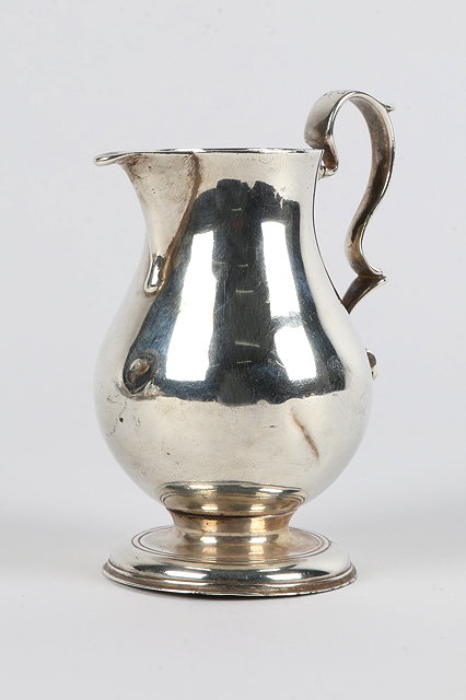 Appraisal: A GEORGE II SMALL SILVER SPARROW BEAK CREAM JUG the