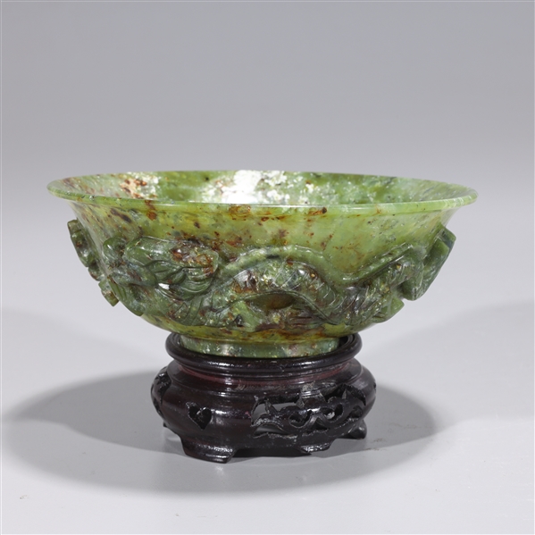 Appraisal: Chinese carved hardstone bowl with twin dragons chasing flaming pearl